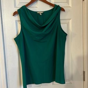 Amber green sleeveless blouse.